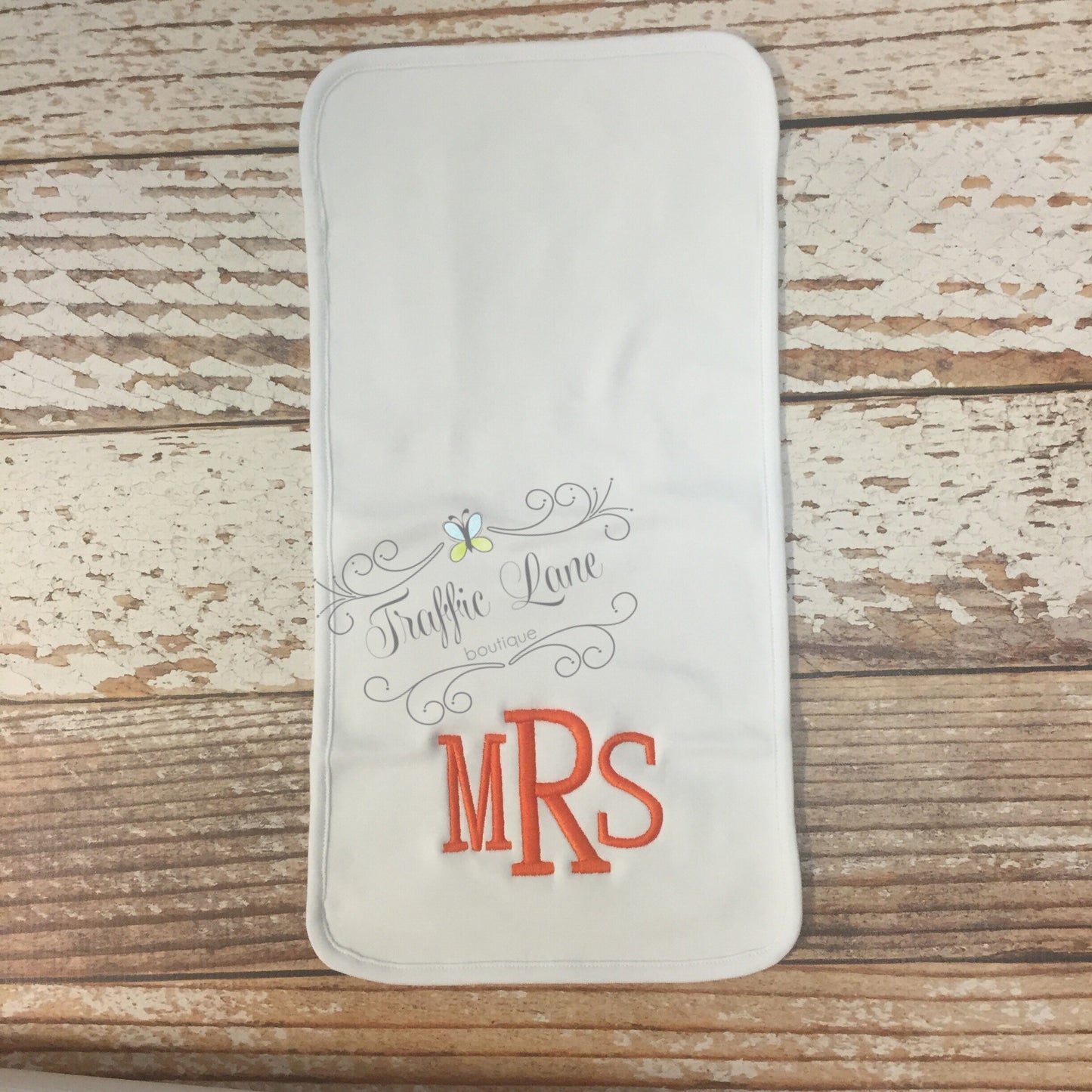 Embroidered burp pad monogrammed