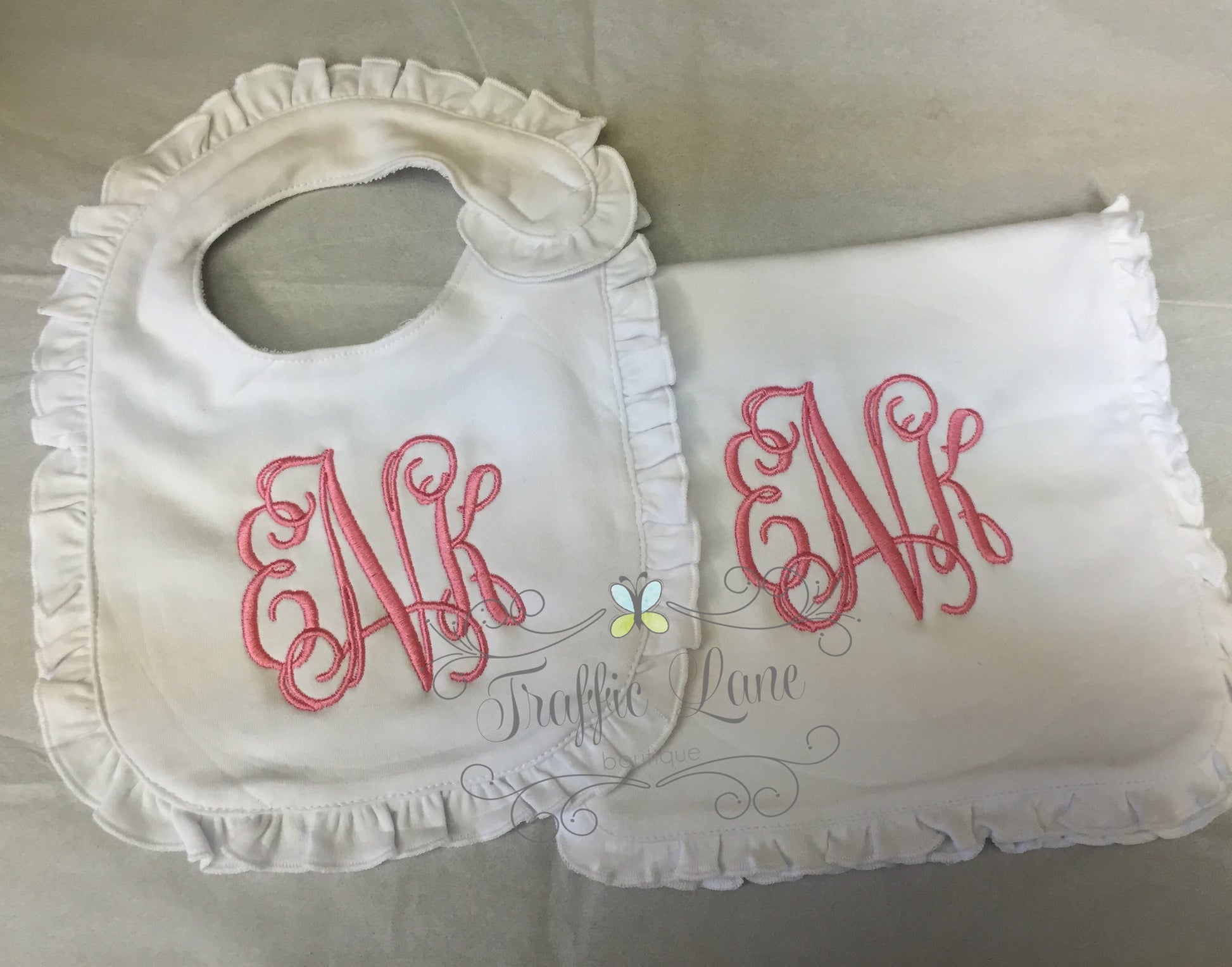 Monogrammed bib and burp pad